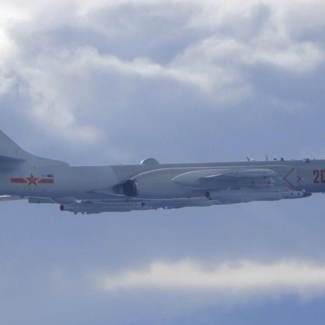 China sends large group of warplanes, navy ships towards Taiwan in forceful display